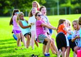 Holy Family Parish in Middletown’s Annual Parish Picnic tug-of-war fun. Photo by Rob McCulley.