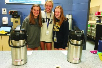 Student workers Alivia Hyland, Christine Moore and Deirdre Carroll.