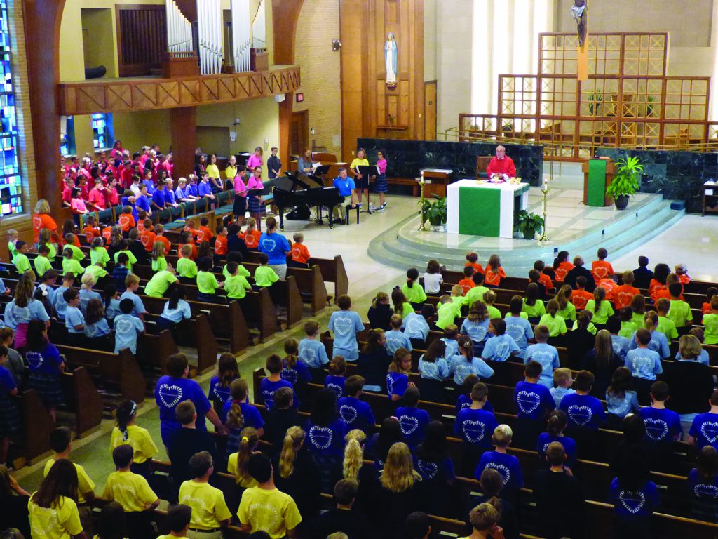 St. Michael Parish School in Sharonville celebrated the first school Mass of the new year on Aug. 30. Students were a rainbow of faith in their new spirit shirts centered around the theme for the year: “Building a Community of Love.”