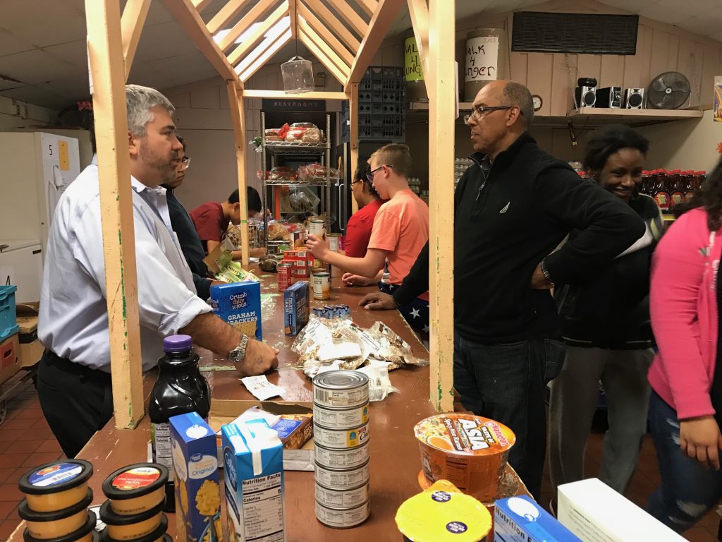 Holy Family Parish eighth grade Parish Religious Education Program (PREP) students visited the Middletown Family Services Choice Pantry. Executive director Maurice Maxwell explained how the pantry operates and students helped stock shelves.