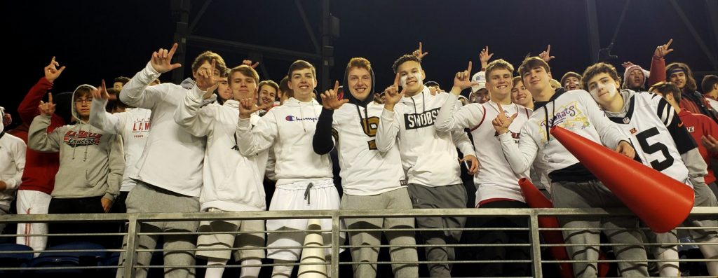 Men of La Salle cheering the Lancers to a fourth State Championship.