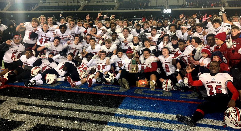 The best: victory formation as the Lancers defeated the Massilon Washington Tigers, 34-17