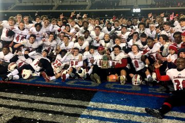 The best: victory formation as the Lancers defeated the Massilon Washington Tigers, 34-17