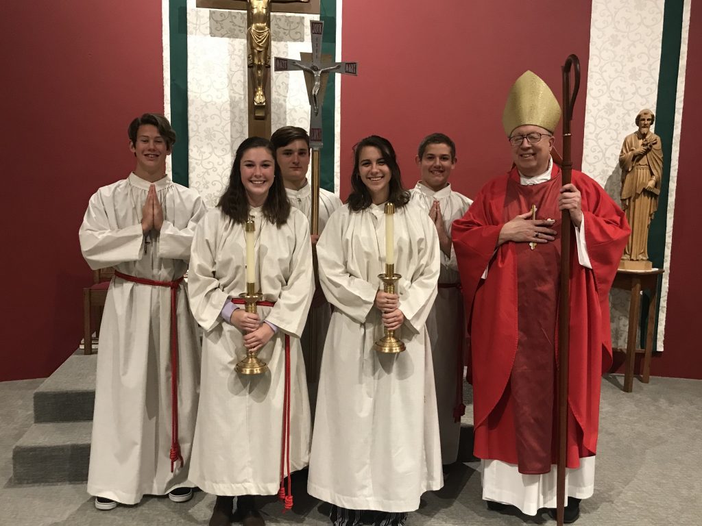 Altar servers represented multiple high schools and home schools at Queen of Peace Parish in Hamilton. Along with Bishop Joseph Binzer, they come together to practice their Catholic faith as they continue their bond with the Church.