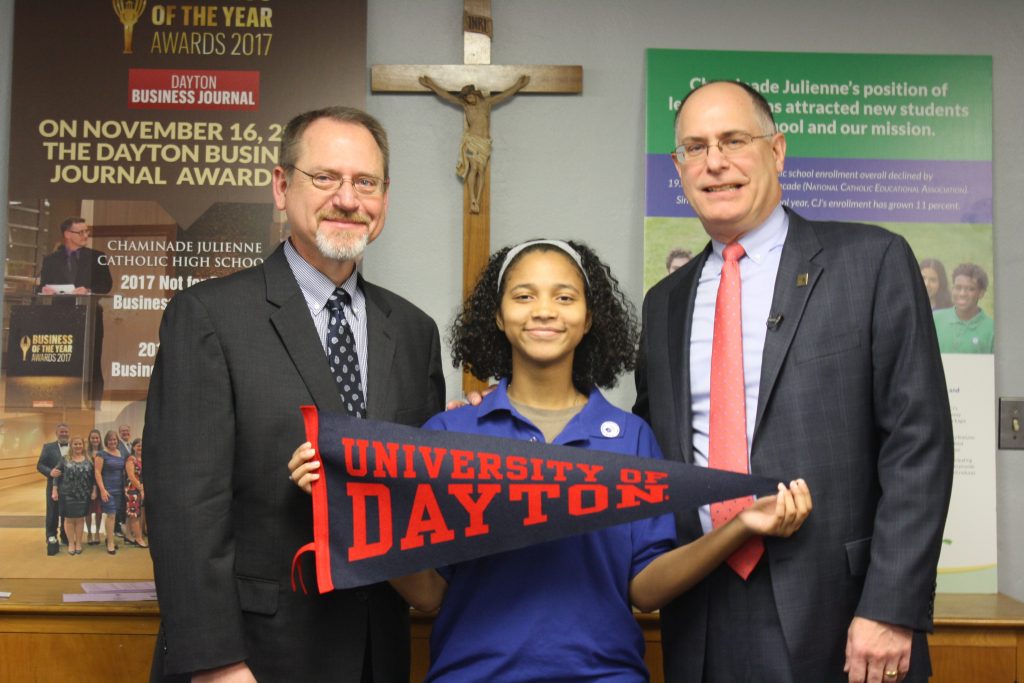 A Chaminade Julienne High School (CJHS) senior received a prestigious scholarship from the University of Dayton. Pictured: CJHS President Dan Meixner, student scholarship winner Havana Glover and University of Dayton President Eric Spina.