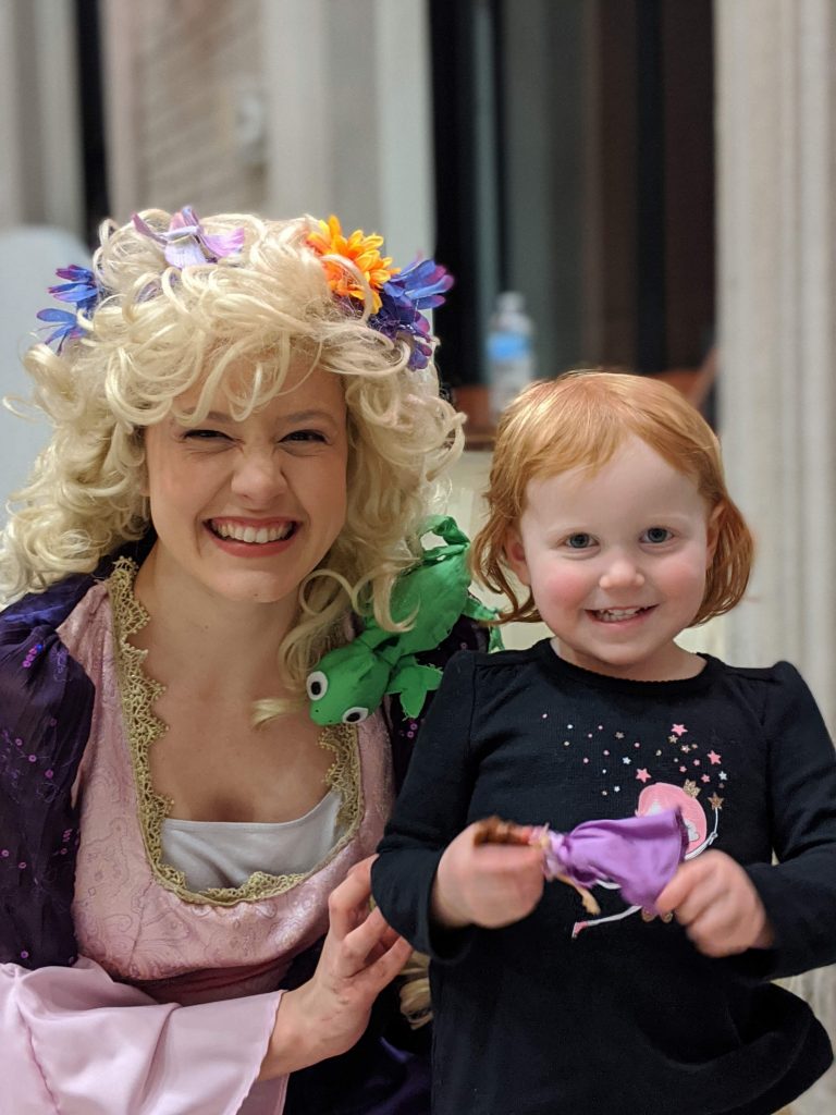 The Angelico Project Family Movie Night presented Tangled-Discovering Christian Symbolism on Jan. 10 at Our Lady of the Holy Spirit Center. The evening included instruction in Christian allegory by Joan Ratajczak and a viewing of Disney's version of the Rapunzel fairy tale, Tangled. Pictured are the Princess Rapunzel (Gracie Francomb) and one of her dear admirers.