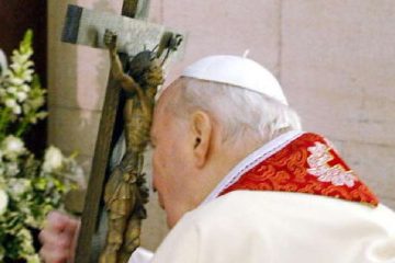 Pope John Paul II attends the Stations Of The Cross ceremony from his private chapel on March 25, 2005 in Vatican City. Credit: Arturo Mari -