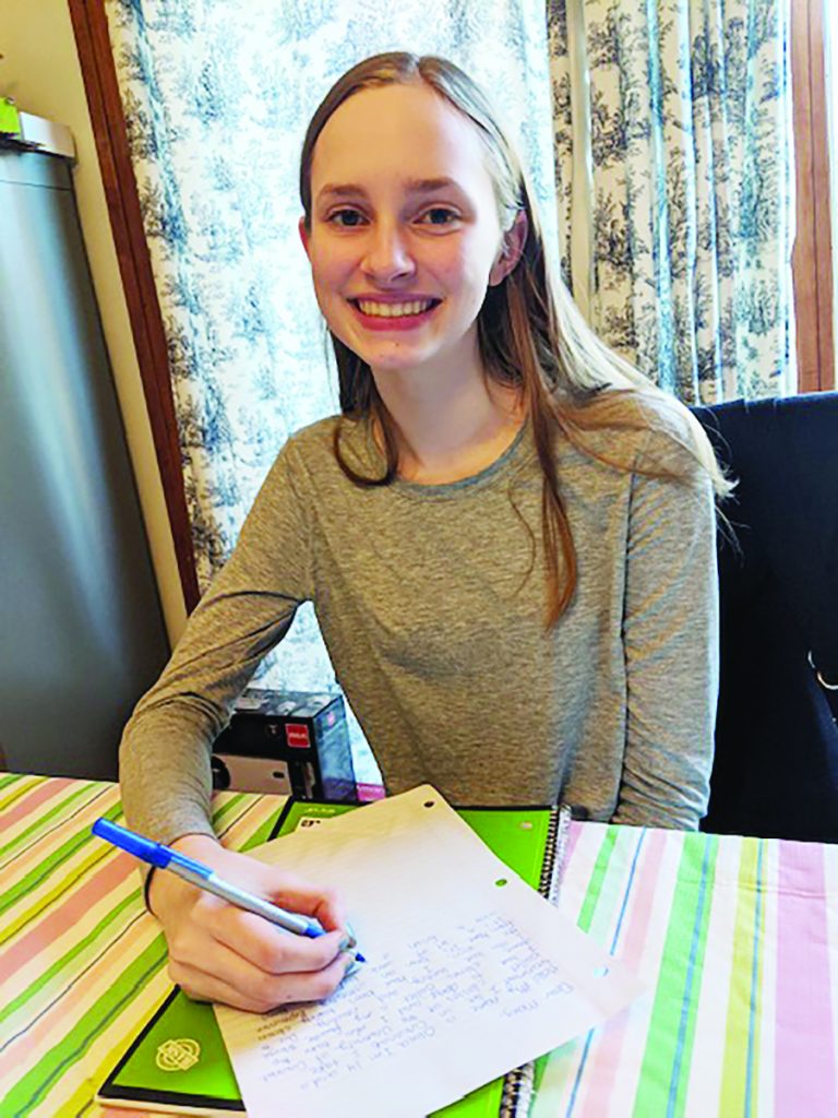 Student Olivia Radecki has joined her siblings in writing letters to nursing home residents while their doors are closed during the pandemic.