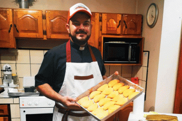 Father Geison Gerardo Ortiz Marín baking bread. Photo courtesy of Father Ortiz.