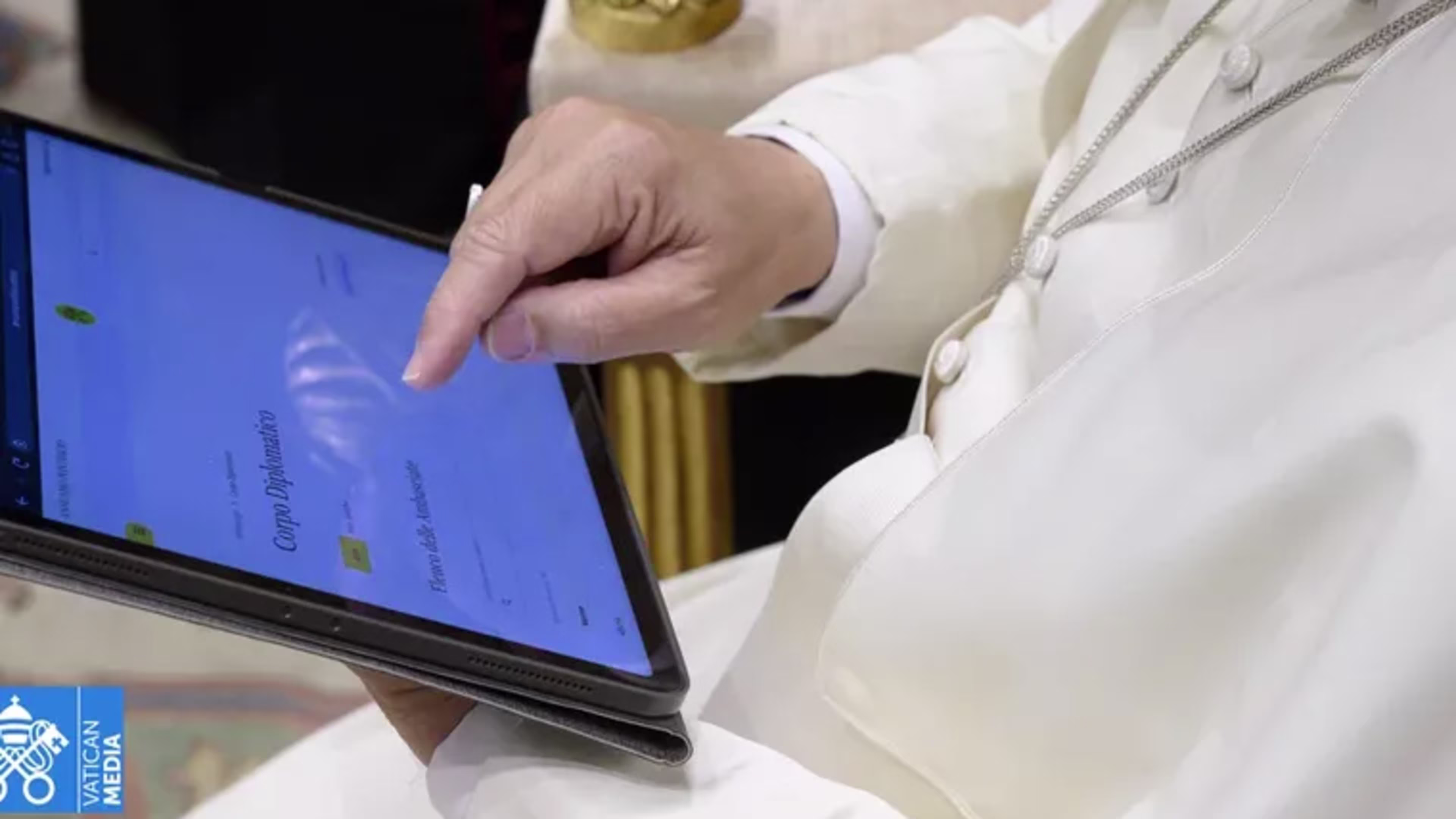 Priest in clerics using tablet