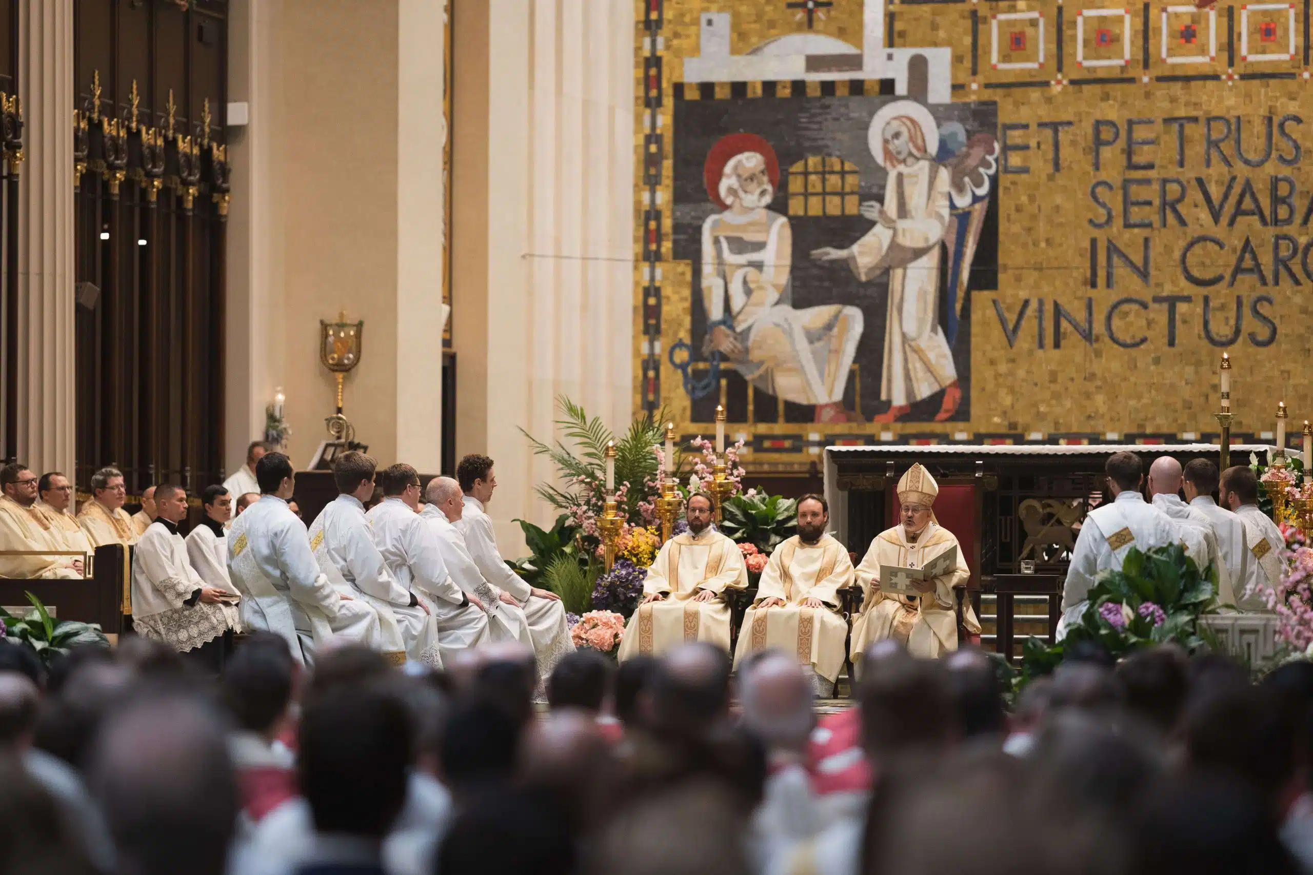 Archbishop Casey Gives Homily from center of cathedral sanctuary