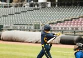 High school baseball player strikes out with humility at the plate