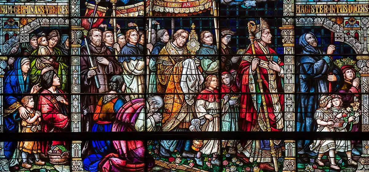stained glass window procession of saints